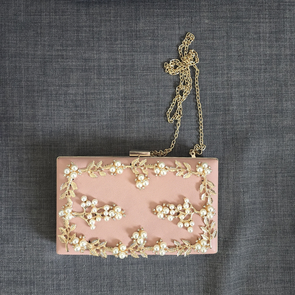 Elegant Pink Clutch with Gold Accents